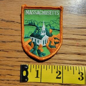 Massachusetts souvenir iron-on patch with fall foliage and a church green orange